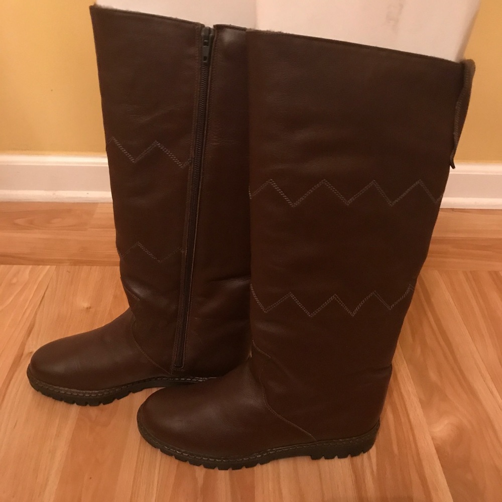 Brown Boots from Europe with a stitching detail.