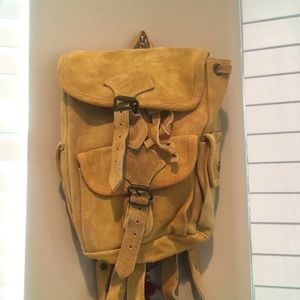 mustard yellow suede buckle backpack!