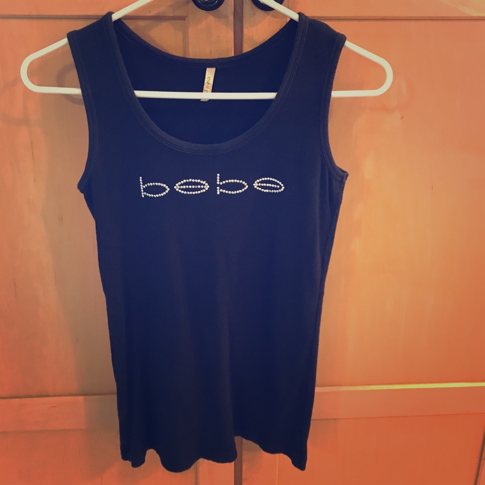 👍Bebe black tank top medium with silver writing.