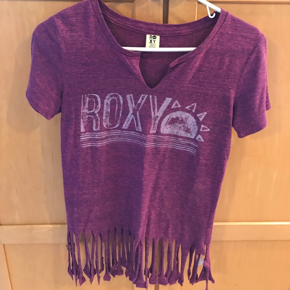 Rocky tshirt small with fringes at the bottom.