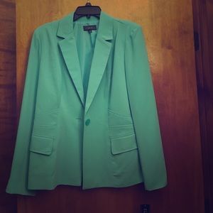 Mint green suit coat with tags still on. Mint green suit coat with tags still on.