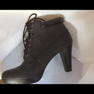 Never worn lace up leather boots.