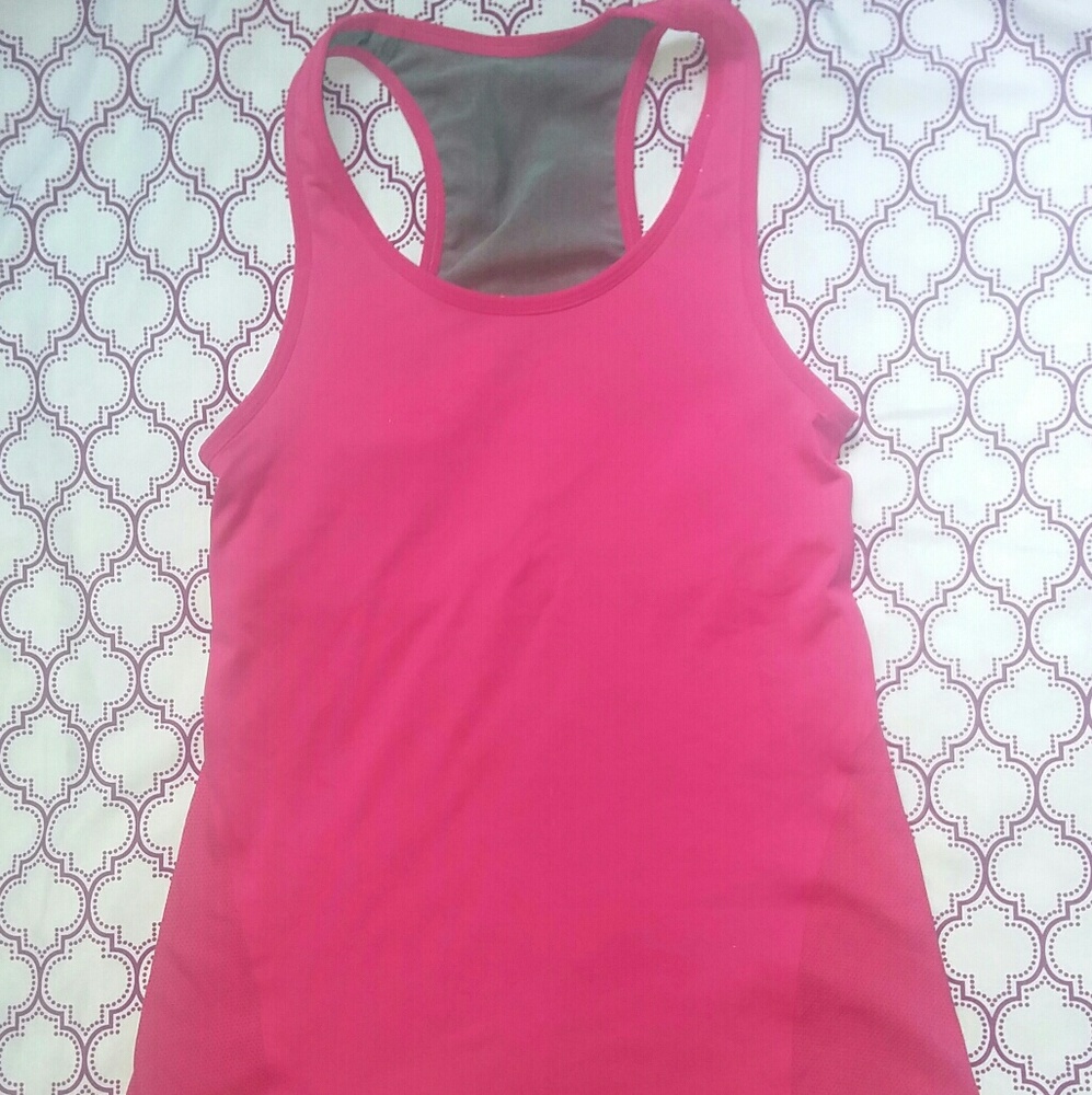 Pink Nike Dri-FIT athletic top
