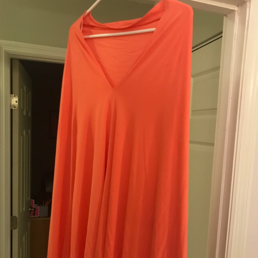 Kerisma Eden Poncho one size. Coral color