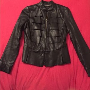 Black leather fitted jacket with ruffle detail