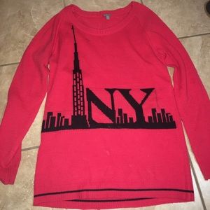 Bright red NYC skyline winter sweater