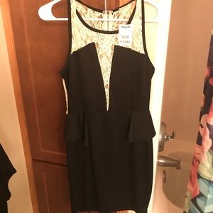 Black peplum dress with white lace, never worn