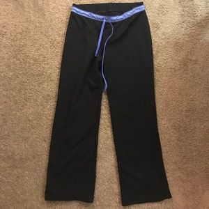 Black sweatpants with blue trim
