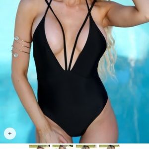 Sexy black swimsuit. Never worn!!