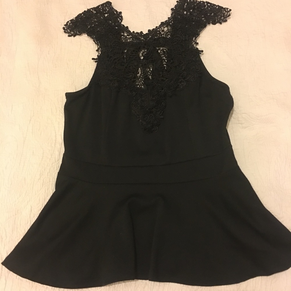 Lace embellished peplum top