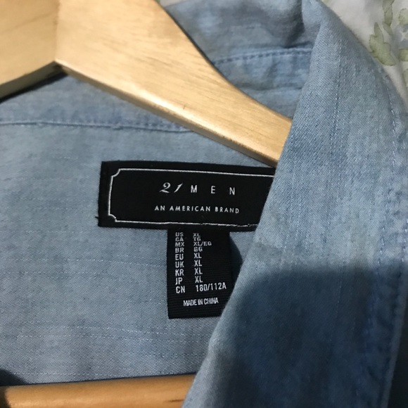 A light blue button up shirt - Picture 3 of 3