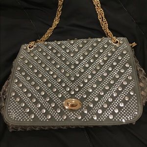 Studded woven handbag