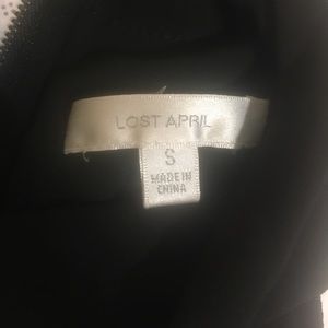 Lost April black sleeveless blouse