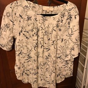 White and black floral swing top loft