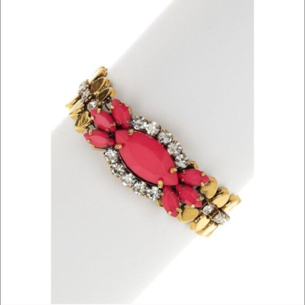 Cute fashion bracelet with pink/coral pendant