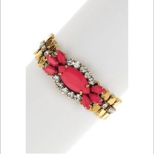 Cute fashion bracelet with pink/coral pendant