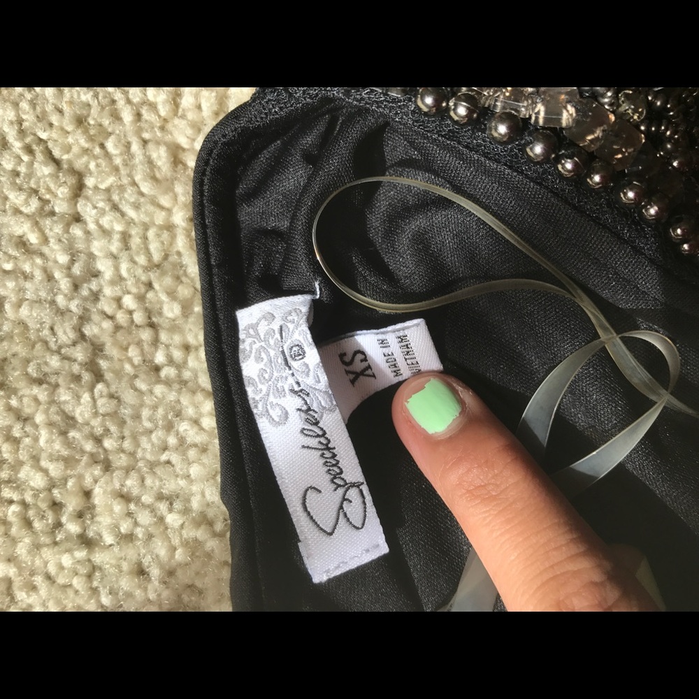 Black cocktail dress. One shoulder