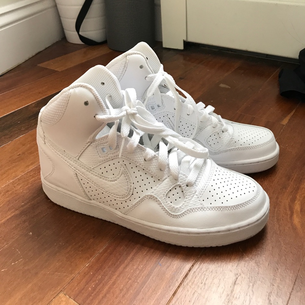 All white Nike high tops