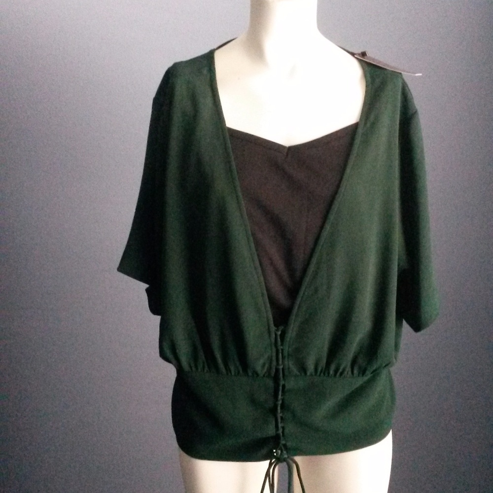 Plunging green v-neck top with lace-up front