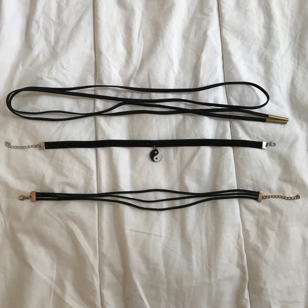 Three black chokers