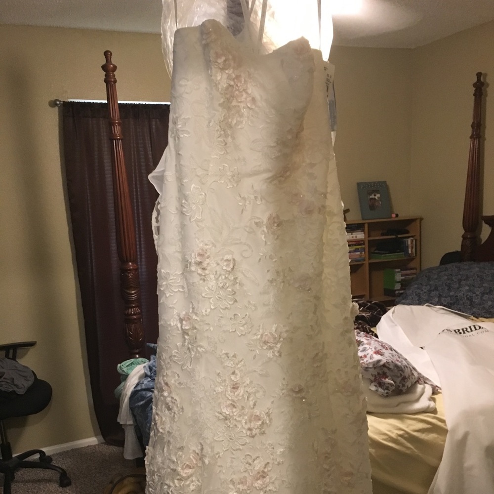 Oleg Cassini wedding gown with sash and sleeves