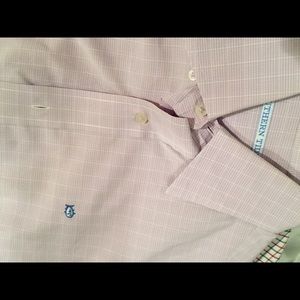 A purple with white stripe small shirt