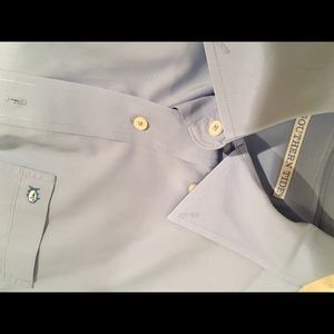 A solid blue southern tide button down