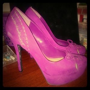 Fuchsia heels. With laces and gold accents.