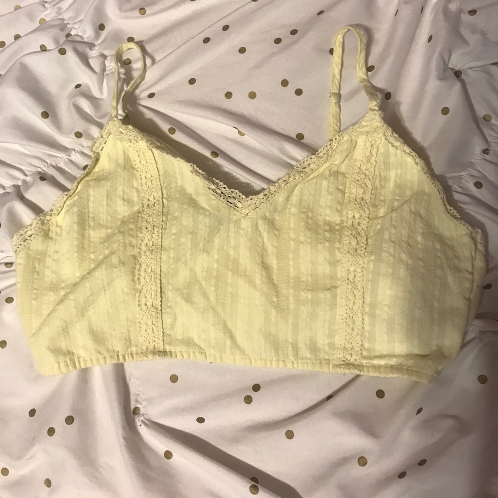 Pale yellow zippered crop top