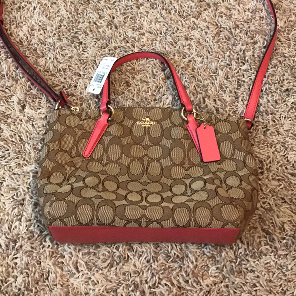 Beautiful brand new coach cross body purse