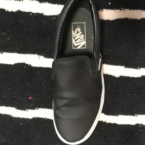 Black perforated vans