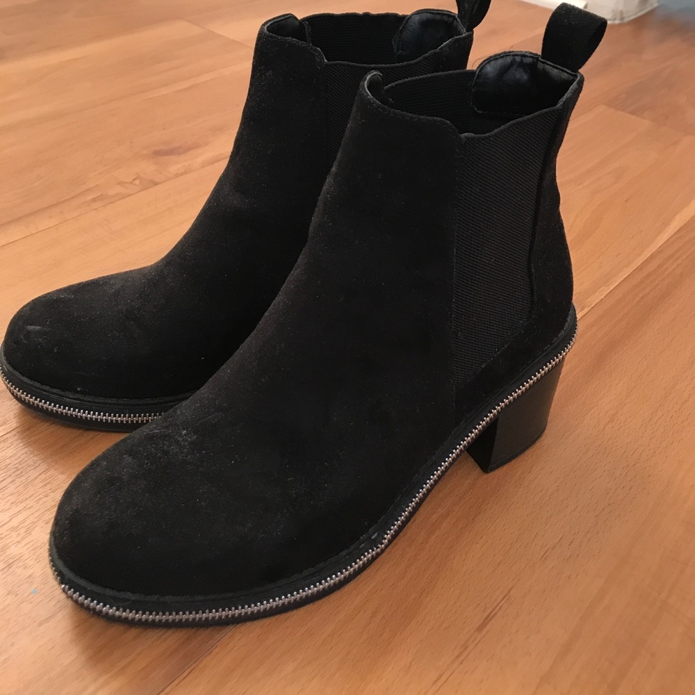 Black booties with zipper detail