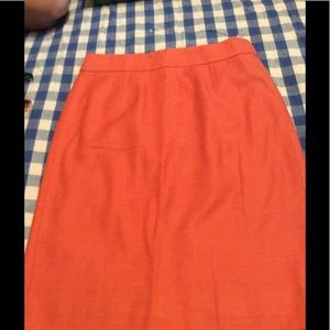 Orange JCrew pencil skirt.