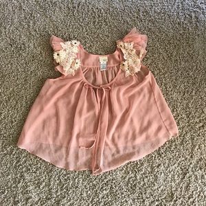 Sheer nude pink colored short sleeved cover up