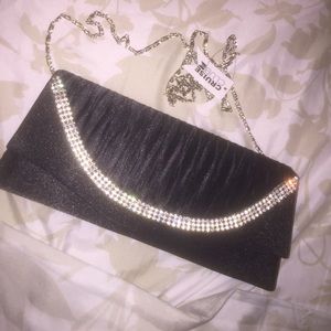 $8 black clutch with studs! Who wants it?