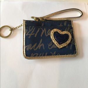 Coach wallet/is holder. Real.