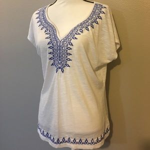 White with blue Apt. 9 top.