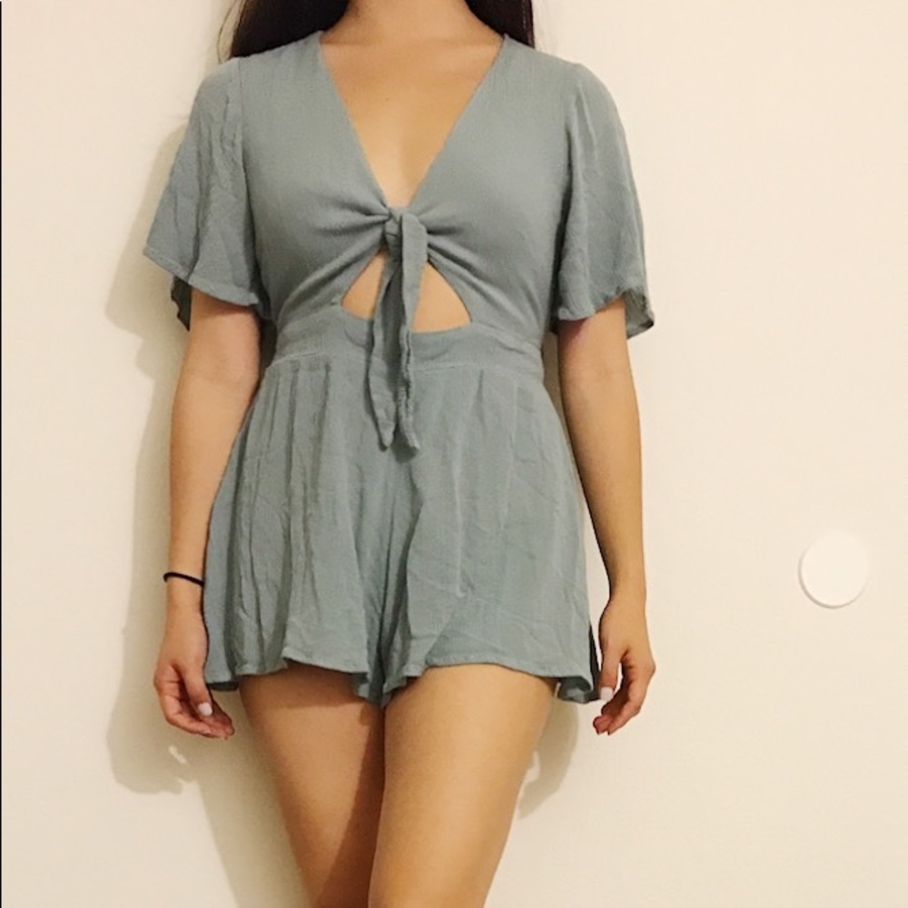 Beautiful pale blue romper with cutout in size S