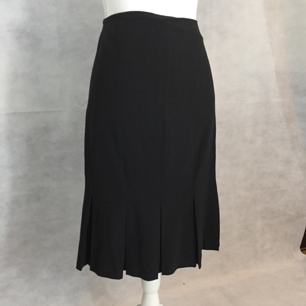 Black skirt with kick pleats