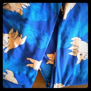 Lularoe Tween leggings.  Flying pigs on blue EUC
