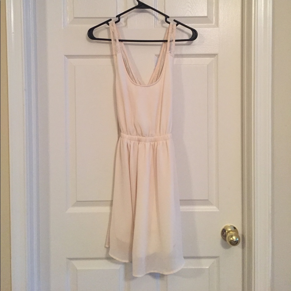 Gorgeous white dress with cross cross lace back