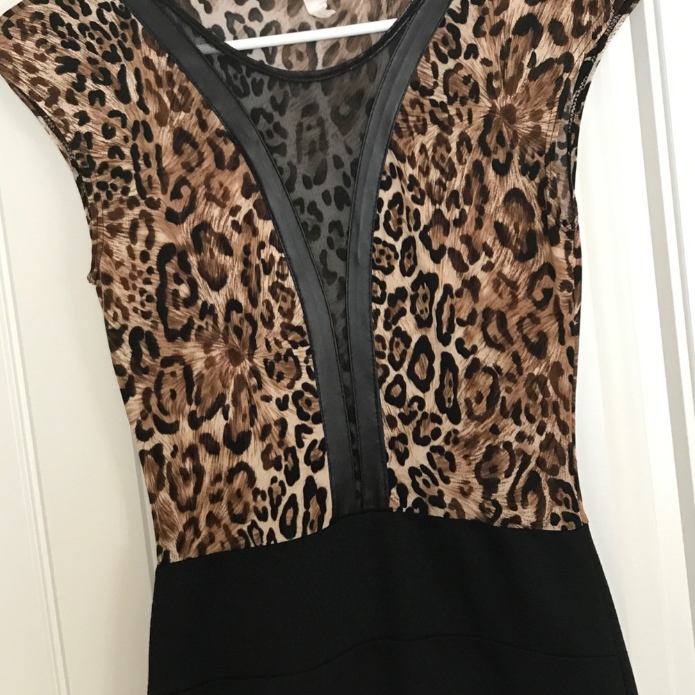 Slim fitting dress black and animal print.