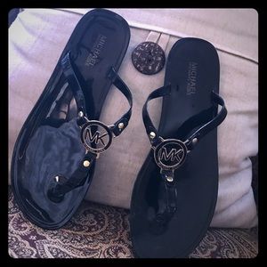 Michael Kors Black and Gold Flip Flops Michael Kors Black and Gold Flip Flops