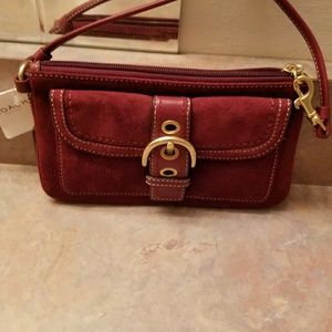 Coach suede clutch never used Coach suede clutch never used