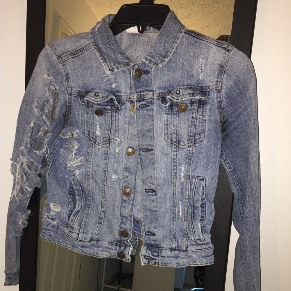 Distressed jean jacket