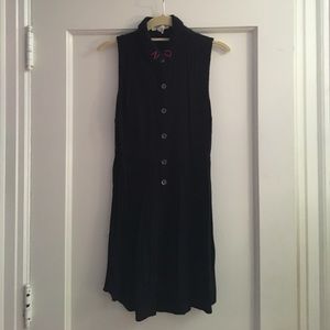 Black sleeveless dress with embroidered collar