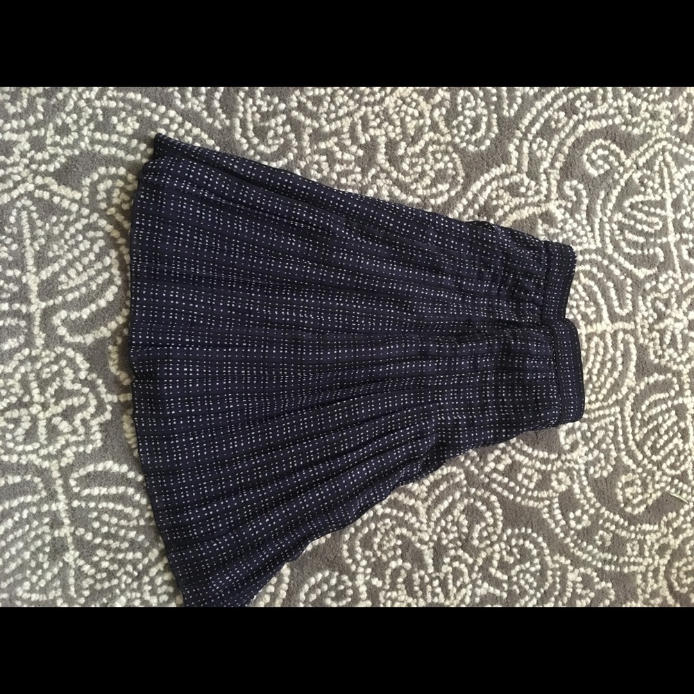 Knee length pleated skirt