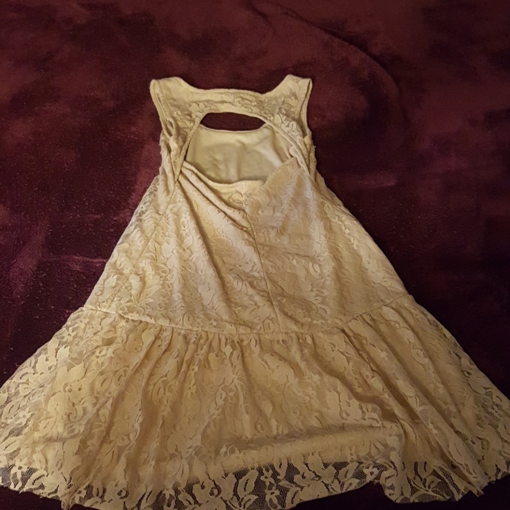 A lacey tan dress