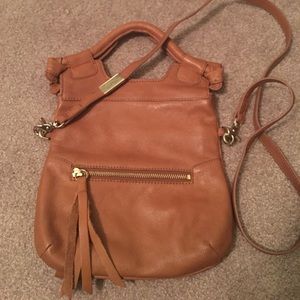 Brown leather fold over Foley and Corinna purse