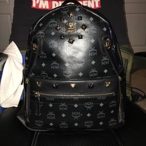 Black dual start mcm bag for men and women